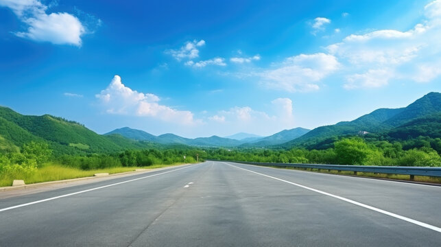Green mountain and empty asphalt highway natural scenery under the blue sky
