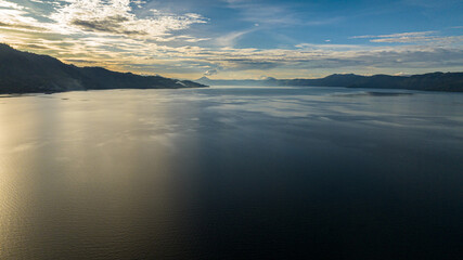 Top view of lake Toba and Samosir Island at sunset. Sumatra, Indonesia.