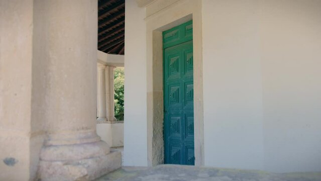restored old chapel in central portugal entrance door gimbal shot