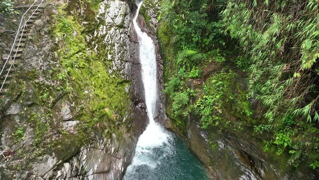 Experience the mesmerizing beauty of tropical waterfalls in Bajos del Toro, Costa Rica's enchanting natural paradise.