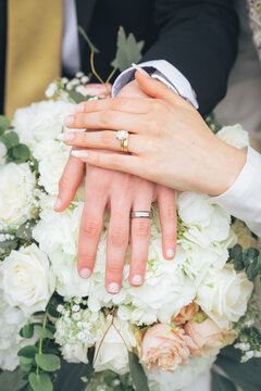 Close Up of Bride holding groom hand with Wedding Rings and White Flowers &ndash; Muslim Wedding, Marriage Ceremony, Love, Romance, Commitment, Engagement, Bridal Jewelry, Islamic Culture, Marriage