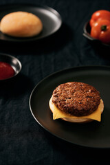 Process making of burger, step by step isolated on black background. Burger wide banner. Split burger. Burger divided in parts