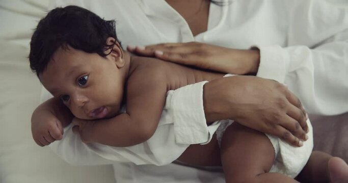 Celebrating African Culture: Mom Providing Nourishment to Her Newborn Baby Boy | Loving Care in the Comfort of Home