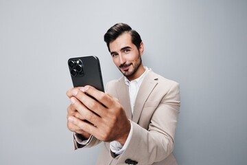 man smile business happy call hold suit smartphone portrait phone male