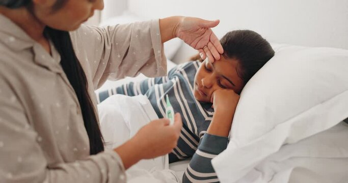 Bed, thermometer check or kid sick from bacteria virus, cold or disease with worried mother help, aid or support. Bedroom, Indian family and mom feel forehead for temperature assessment of ill child