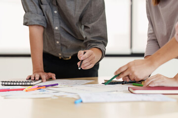 Close up of developer and ui designer brainstorming interface wireframe design.Creative digital...
