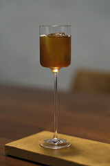 glass of coffee on wooden table