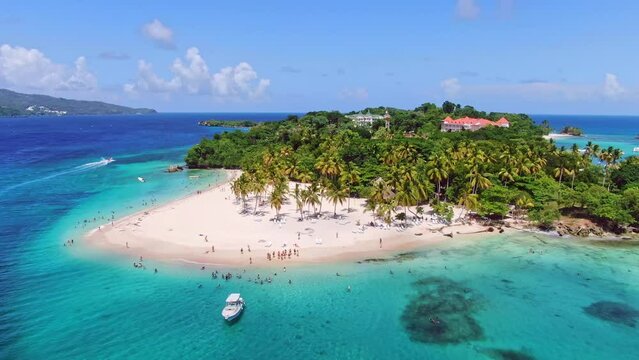 Breathtaking Paradise Of Cayo Levantado With Tourists Having Vacation During Summertime In Samana, Dominican Republic. aerial, pan shot