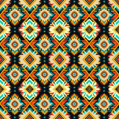 Tribal vector ornament. Seamless African pattern. Ethnic carpet with chevrons. Aztec style. Geometric mosaic on the tile, majolica. Ancient interior. Modern rug. Geo print on textile. Kente Cloth.