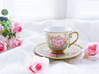 Antique cup of tea with pink rose on pink background ,Valentine's day romantic ,Mother's day ,pretty background or wallpaper ,Chinese traditional ,wedding card design ,coffee cup ,lovely love card 