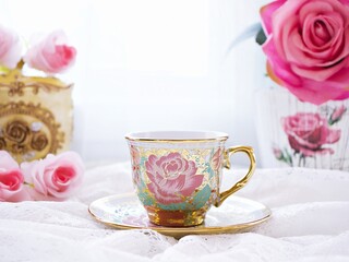 Antique cup of tea with pink rose on pink background ,Valentine's day romantic ,Mother's day ,pretty background or wallpaper ,Chinese traditional ,wedding card design ,coffee cup ,lovely love card 