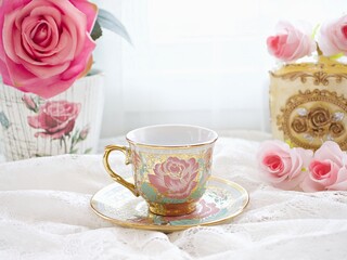 Antique cup of tea with pink rose on pink background ,Valentine's day romantic ,Mother's day ,pretty background or wallpaper ,Chinese traditional ,wedding card design ,coffee cup ,lovely love card 