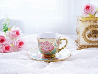Antique cup of tea with pink rose on pink background ,Valentine's day romantic ,Mother's day ,pretty background or wallpaper ,Chinese traditional ,wedding card design ,coffee cup ,lovely love card 