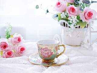 Antique cup of tea with pink rose on pink background ,Valentine's day romantic ,Mother's day ,pretty background or wallpaper ,Chinese traditional ,wedding card design ,coffee cup ,lovely love card 