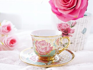 Antique cup of tea with pink rose on pink background ,Valentine's day romantic ,Mother's day ,pretty background or wallpaper ,Chinese traditional ,wedding card design ,coffee cup ,lovely love card 