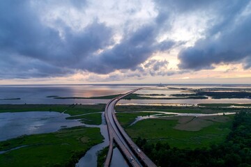 Jubilee Parkway bridge and Mobile Bay at sunset