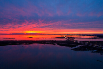 Jubilee Parkway bridge and Mobile Bay at sunset