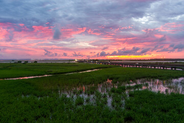 Pink sky at sunset on Mobile Bay, Alabama