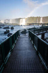 Beautiful view to catwalk for tourists over waterfalls in Iguassu