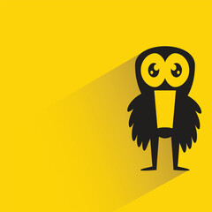 doodle monster with shadow on yellow background