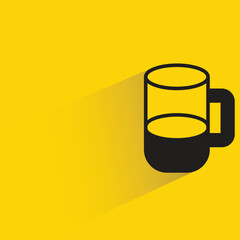 water glass with shadow on yellow background