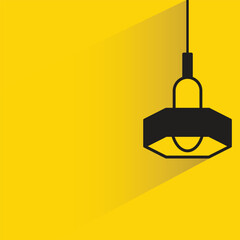 ceiling lamp with shadow on yellow background