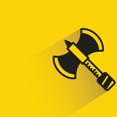 war axe with shadow on yellow background