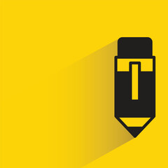 pencil with shadow on yellow background