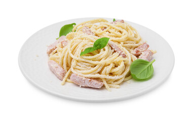 Plate of tasty pasta Carbonara with basil leaves isolated on white