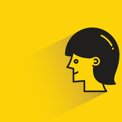 woman side view with shadow on yellow background
