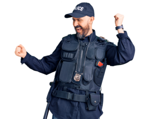 Young handsome man wearing police uniform dancing happy and cheerful, smiling moving casual and confident listening to music