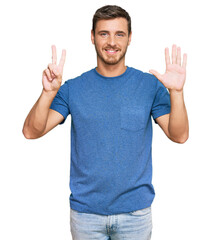 Handsome caucasian man wearing casual clothes showing and pointing up with fingers number seven while smiling confident and happy.