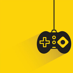 gamepad and joystick with shadow on yellow background