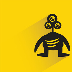 alien monster character on yellow background