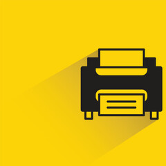 printer with shadow on yellow background