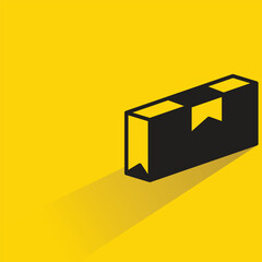 carton box with shadow on yellow background