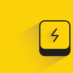 power bank with shadow on yellow background