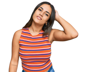 Young brunette woman wearing casual clothes confuse and wonder about question. uncertain with doubt, thinking with hand on head. pensive concept.