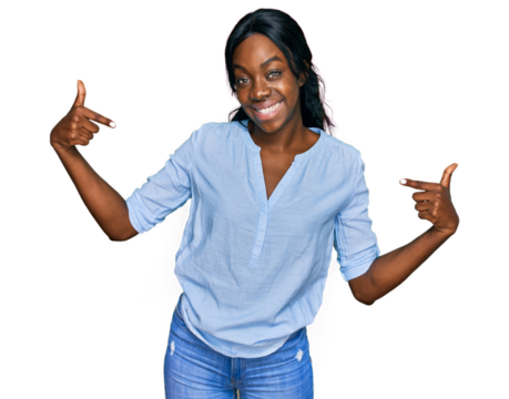 Young african american woman wearing casual clothes looking confident with smile on face, pointing oneself with fingers proud and happy.