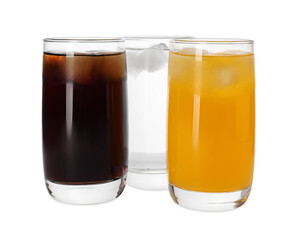 Glasses of different refreshing soda water with ice cubes on white background