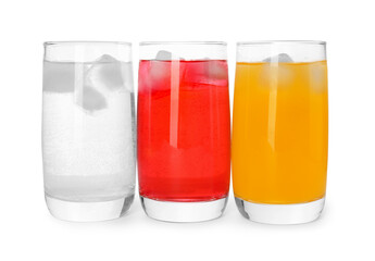 Glasses of different refreshing soda water with ice cubes on white background