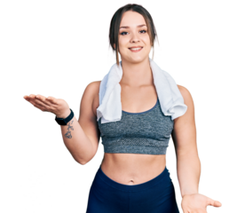 Young hispanic girl wearing sportswear and towel smiling cheerful with open arms as friendly welcome, positive and confident greetings