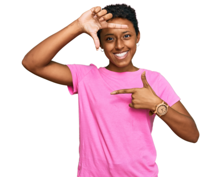 Young african american woman wearing casual clothes smiling making frame with hands and fingers with happy face. creativity and photography concept.