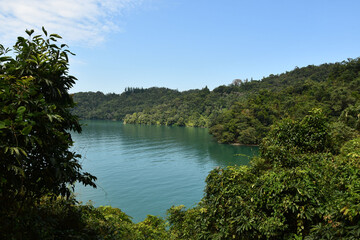 Beautiful view of the Sun Moon Lake in Taiwan surrounded by lush green forests
