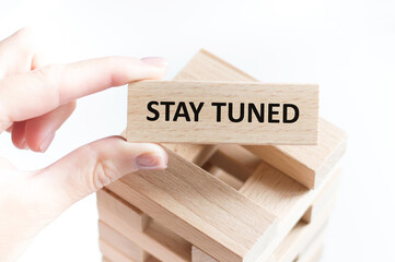 Stay tuned.Text on cubes. Cubes in construction. Business concept