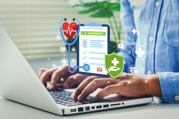 man typing computer for medical icons concept of health insurance family health care access to...