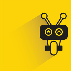 cute robot with shadow on yellow background