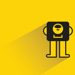 cartoon monster with shadow on yellow background