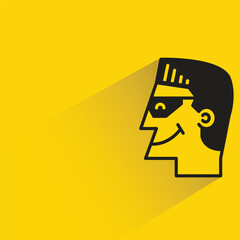 male face avatar with shadow on yellow background