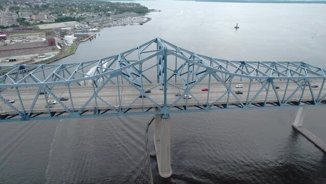 Aerial orbit view of Braga Bridge and Battleship Cove in Fall River, MA.